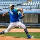 man pitching the baseball