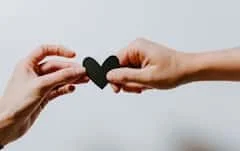 Thanks For Your Interest In relationships911.org two person holding papercut heart